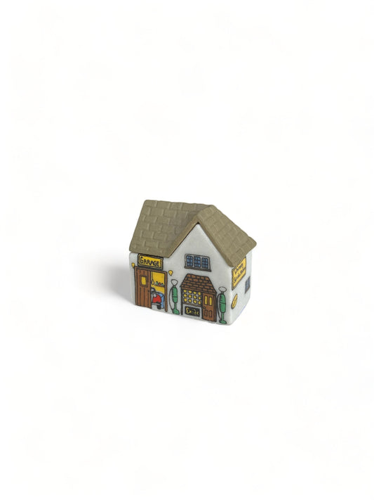 Ceramic Cottage Ornament with Yellow Windows