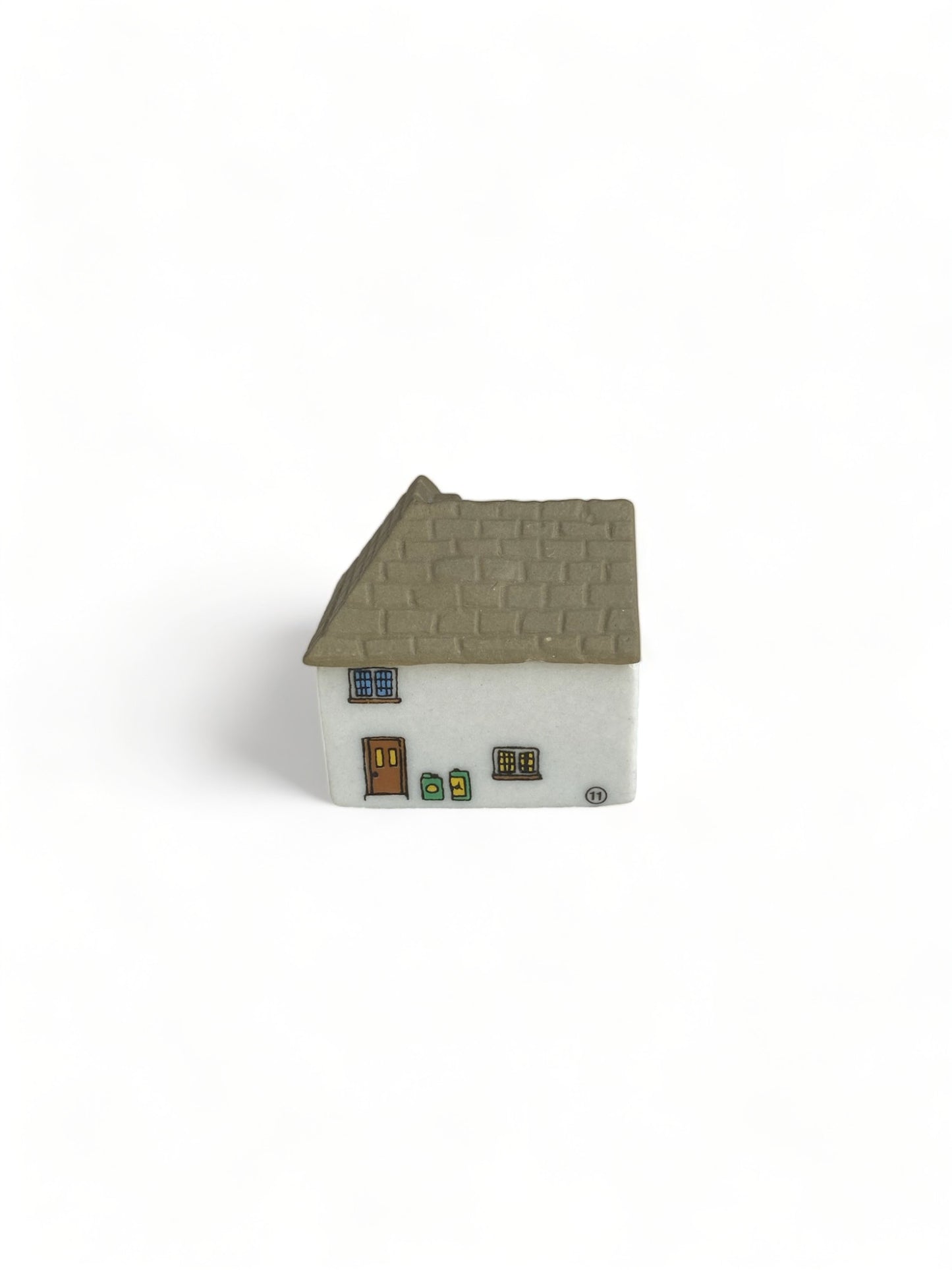 Ceramic Cottage Ornament with Yellow Windows